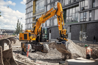 Mobilbagger Hydrema MX 17 Verstellausleger & Schild mieten