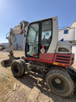 Takeuchi Mobilbagger TB 295 W V 3 mit Powertilt HS 08