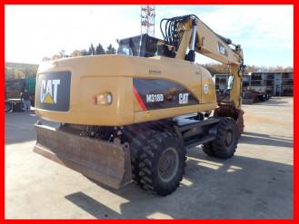Caterpillar M 318 D Mobilbagger rent